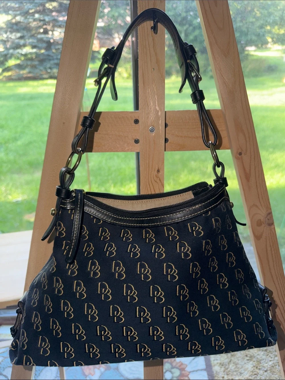 Dooney & Bourke Black with Gold Monogram Hobo Bag